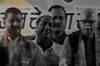 Cong targets Advani for sharing stage with bootlegger