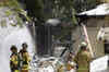 Plane splits Florida home in half; pilot dies