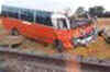 Train collides with school bus, kills 3 children