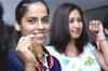 Hyderabad welcomes champs Saina, Jwala