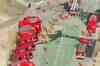 Japan continues nuclear struggle, raises alert level
