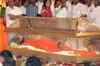 Devotees mourn Sai's death, gather for last 'darshan'