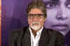 Spotted: Big B getting bored at a promotional event