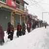 Rain, snowfall throws life out of gear